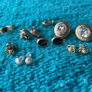 Lot of vintage gold tone, crystal earrings.Trifari